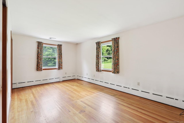 1 Old Middle Rd, New Milford, CT 06776 - empty room with wood finished floors and healthy amount of natural light