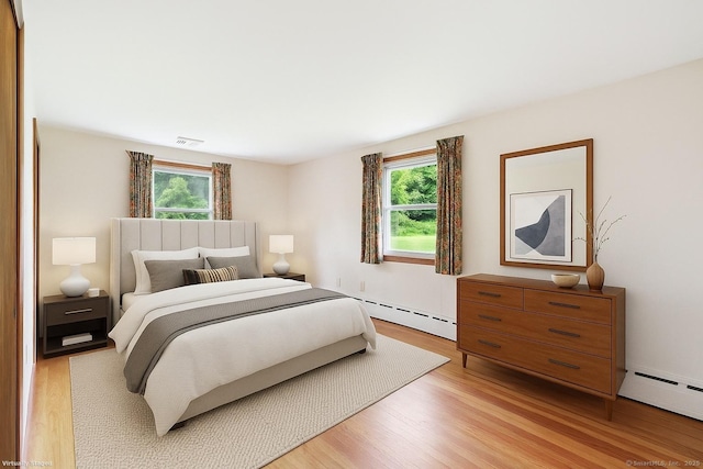 1 Old Middle Rd, New Milford, CT 06776 - bedroom with multiple windows, baseboard heating, and light wood finished floors