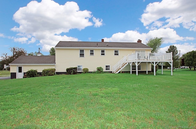 5 Great Meadow Dr, North Haven, CT 06473 - back of property with stairway, a deck, a yard, and a chimney