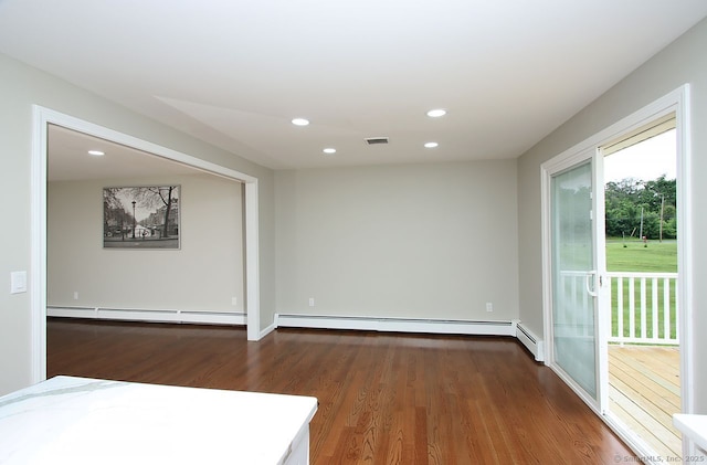 5 Great Meadow Dr, North Haven, CT 06473 - empty room with wood finished floors, a baseboard radiator, and recessed lighting