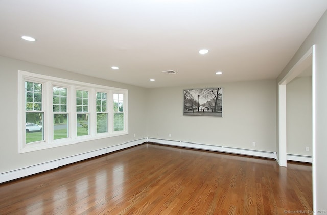 5 Great Meadow Dr, North Haven, CT 06473 - unfurnished room featuring recessed lighting, wood finished floors, and baseboard heating