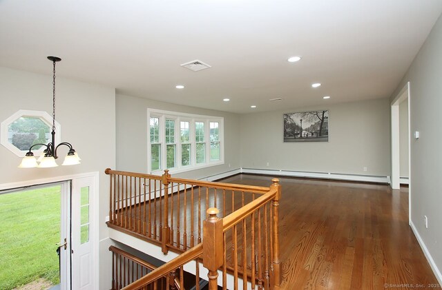 5 Great Meadow Dr, North Haven, CT 06473 - hall with a chandelier, wood finished floors, recessed lighting, an upstairs landing, and a baseboard radiator