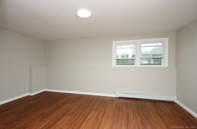 5 Great Meadow Dr, North Haven, CT 06473 - spare room featuring baseboard heating and wood finished floors