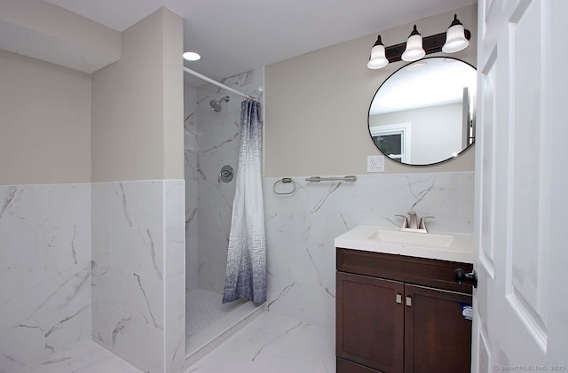 5 Great Meadow Dr, North Haven, CT 06473 - bathroom with marble finish floors, vanity, a marble finish shower, tile walls, and wainscoting
