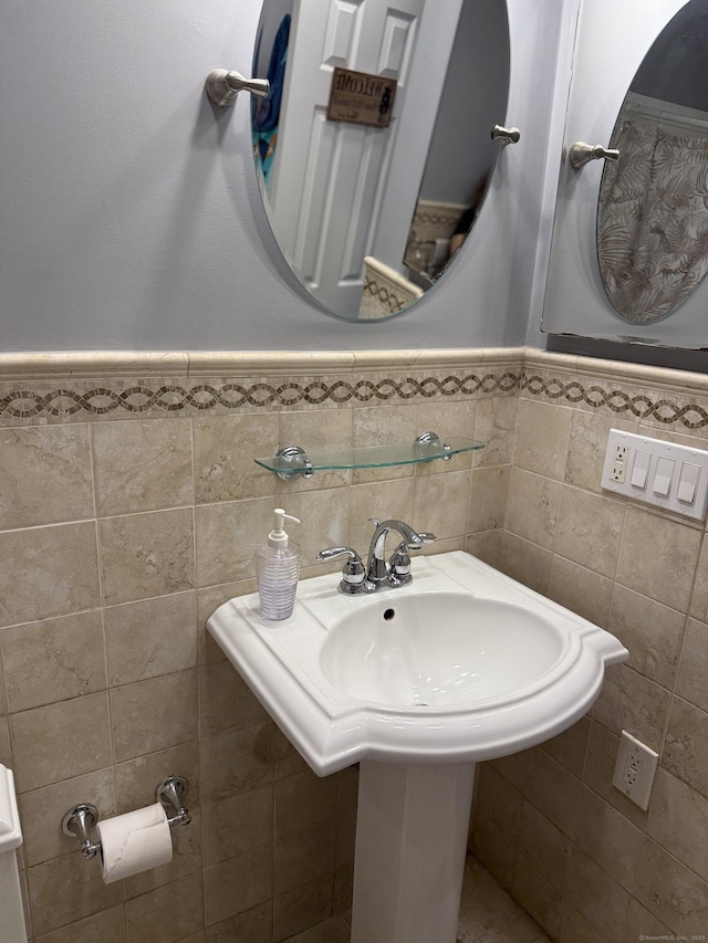 71 Aiken St Apt N7, Norwalk, CT 06851 - bathroom featuring wainscoting