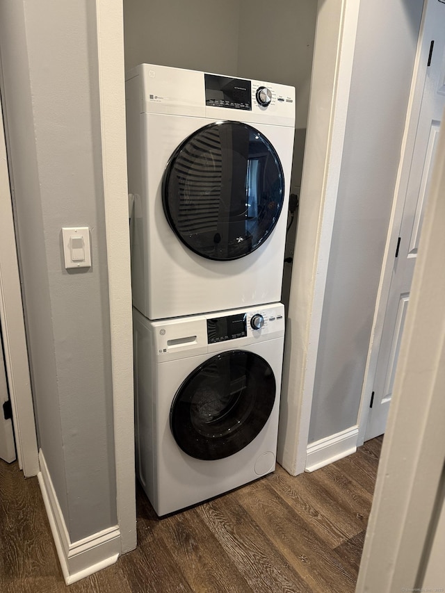 71 Aiken St Apt N7, Norwalk, CT 06851 - laundry room with estacked washer and dryer and wood finished floors