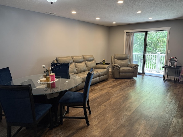 71 Aiken St Apt N7, Norwalk, CT 06851 - dining area with wood finished floors, recessed lighting, and a textured ceiling