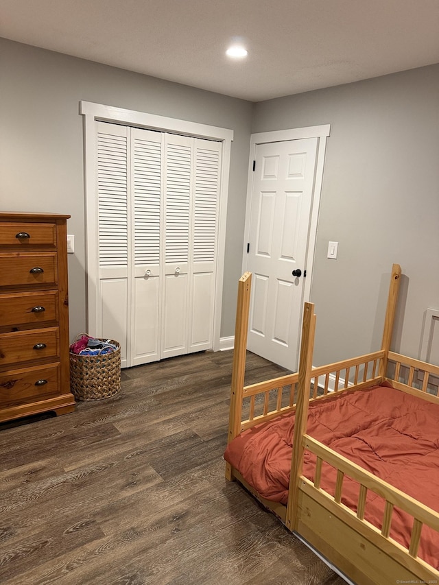 71 Aiken St Apt N7, Norwalk, CT 06851 - bedroom with dark wood-style floors, recessed lighting, and a closet
