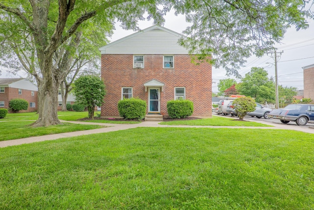 51 Park Ave Unit 2-13, Danbury, CT 06810 - view of front of home featuring brick siding and a front lawn