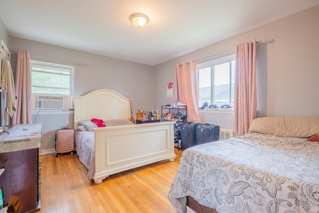 51 Park Ave Unit 2-13, Danbury, CT 06810 - bedroom with light wood-style floors and cooling unit