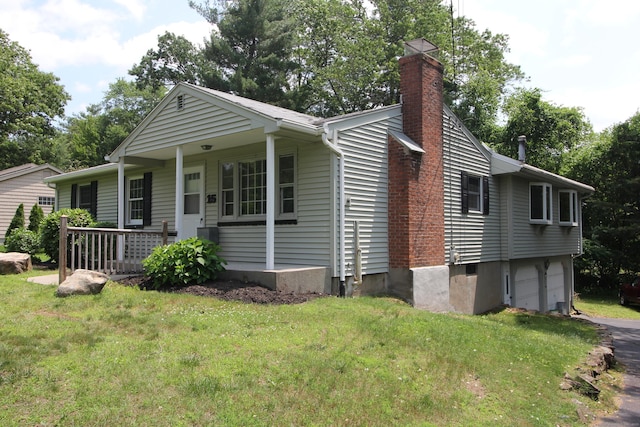 15 Birch Rd, Granby, CT 06035 - view of front of house with a garage, a front lawn, a chimney, and driveway