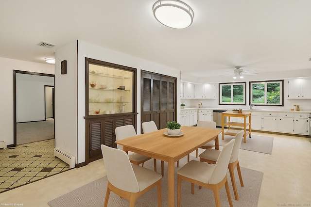 256 W Rocks Rd, Norwalk, CT 06851 - dining space featuring baseboard heating, light flooring, and a ceiling fan