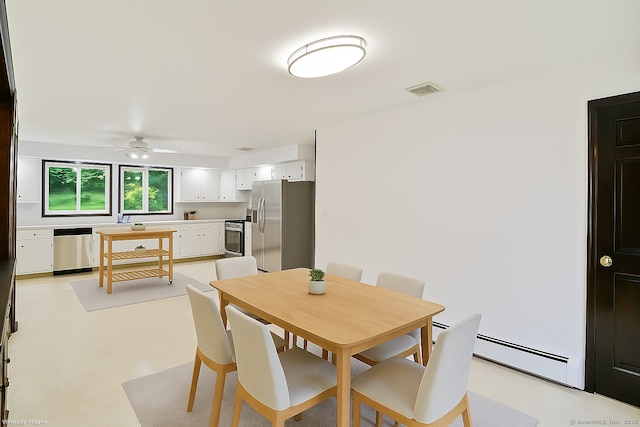 256 W Rocks Rd, Norwalk, CT 06851 - dining space featuring a ceiling fan and a baseboard heating unit