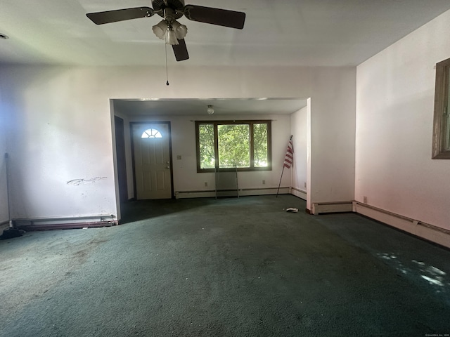 117 State Ave, Killingly, CT 06241 - empty room featuring carpet flooring, ceiling fan, and a baseboard heating unit