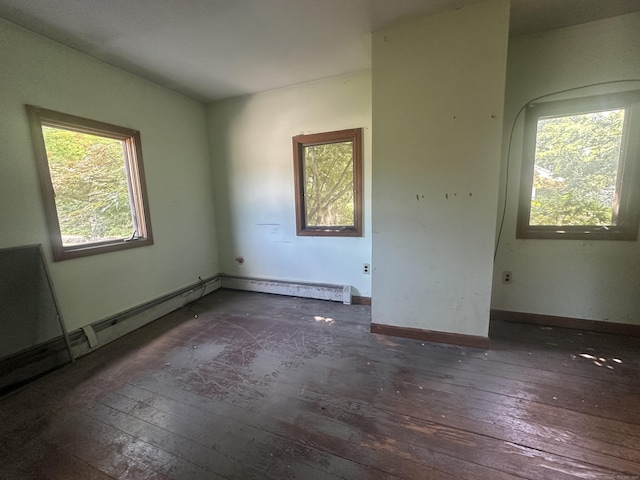 117 State Ave, Killingly, CT 06241 - empty room with hardwood / wood-style flooring and baseboards