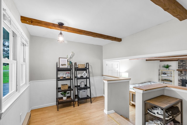 45 Neelans Rd, Enfield, CT 06082 - office with beamed ceiling, light wood-style floors, and a baseboard radiator