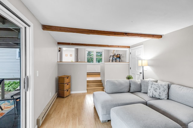 45 Neelans Rd, Enfield, CT 06082 - living area featuring a baseboard heating unit, light wood finished floors, and beamed ceiling