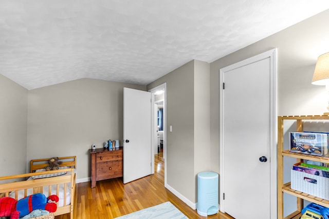 45 Neelans Rd, Enfield, CT 06082 - bedroom featuring wood finished floors and a textured ceiling
