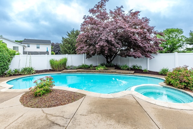 45 Neelans Rd, Enfield, CT 06082 - view of swimming pool featuring a fenced backyard, an in-ground hot tub, and a patio