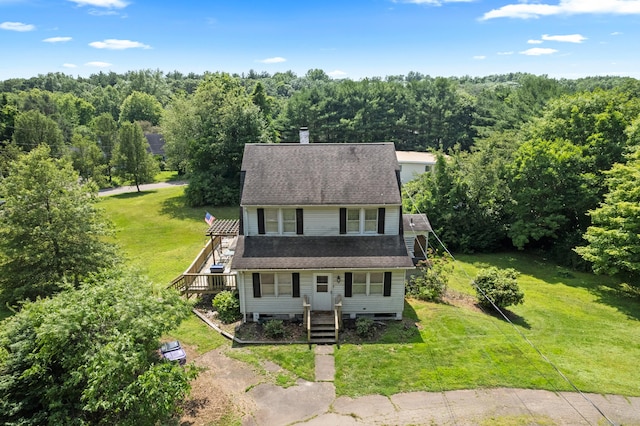 1092 Durham Rd, Guilford, CT 06437 - view of front facade featuring stairs, a front lawn, a wooded view, and a shingled roof
