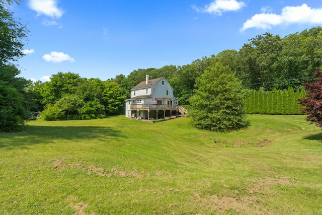 1092 Durham Rd, Guilford, CT 06437 - view of grassy yard with a deck