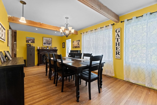 1092 Durham Rd, Guilford, CT 06437 - dining area with beamed ceiling, light wood finished floors, and a chandelier