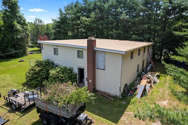 1092 Durham Rd, Guilford, CT 06437 - rear view of property with a lawn and a garden