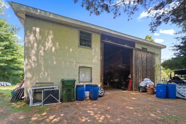 1092 Durham Rd, Guilford, CT 06437 - back of property featuring an outdoor structure and concrete block siding