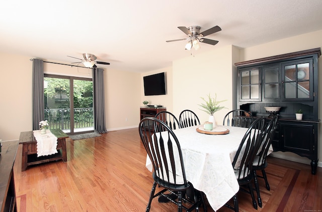 140 Thompson St Apt 16A, East Haven, CT 06513 - dining space with a ceiling fan and light wood-style flooring