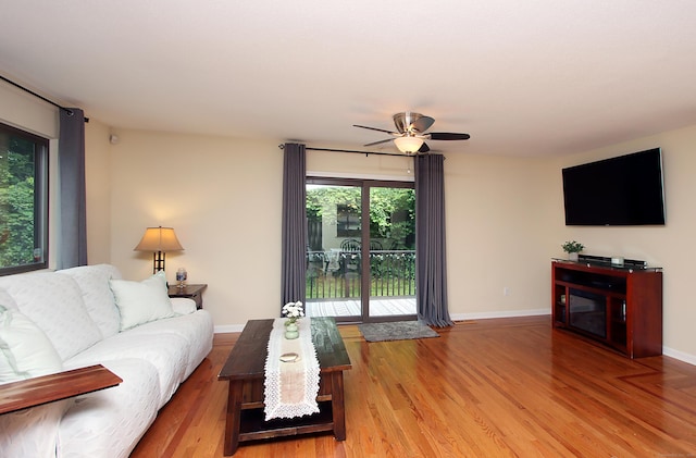 140 Thompson St Apt 16A, East Haven, CT 06513 - living room with wood finished floors and ceiling fan