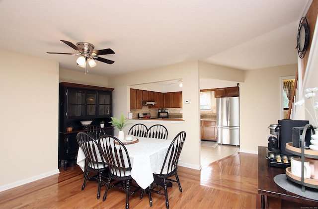 140 Thompson St Apt 16A, East Haven, CT 06513 - dining space with ceiling fan and light wood-type flooring