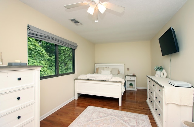 140 Thompson St Apt 16A, East Haven, CT 06513 - bedroom with dark wood finished floors and ceiling fan