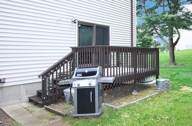 140 Thompson St Apt 16A, East Haven, CT 06513 - wooden deck featuring grilling area and a yard