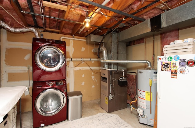 140 Thompson St Apt 16A, East Haven, CT 06513 - laundry room with water heater and stacked washer and clothes dryer