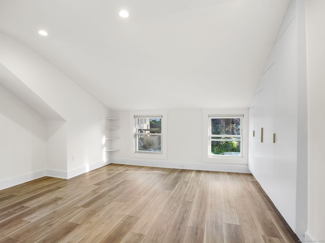 8 Platt St, Norwalk, CT 06855 - unfurnished living room featuring vaulted ceiling, light wood-type flooring, and recessed lighting