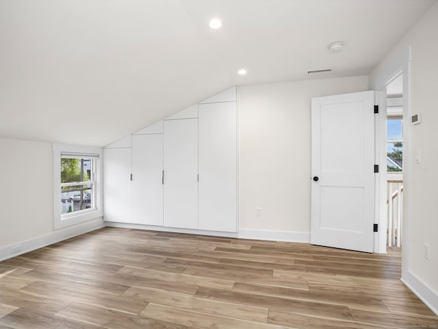 8 Platt St, Norwalk, CT 06855 - additional living space featuring lofted ceiling, light wood finished floors, and recessed lighting