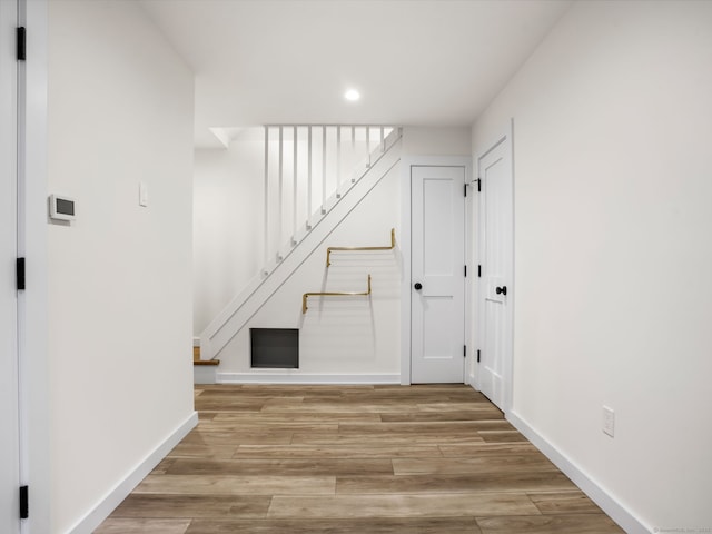 8 Platt St, Norwalk, CT 06855 - corridor featuring stairway, recessed lighting, and light wood-style floors