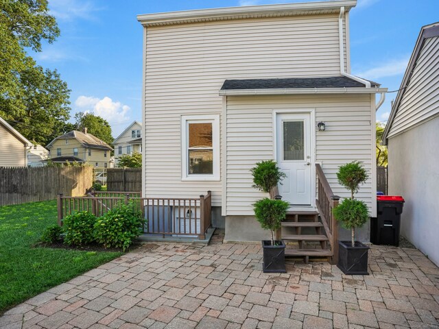 8 Platt St, Norwalk, CT 06855 - rear view of house with entry steps and a patio area