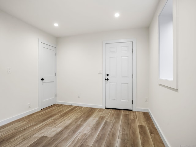 8 Platt St, Norwalk, CT 06855 - foyer with light wood finished floors and recessed lighting
