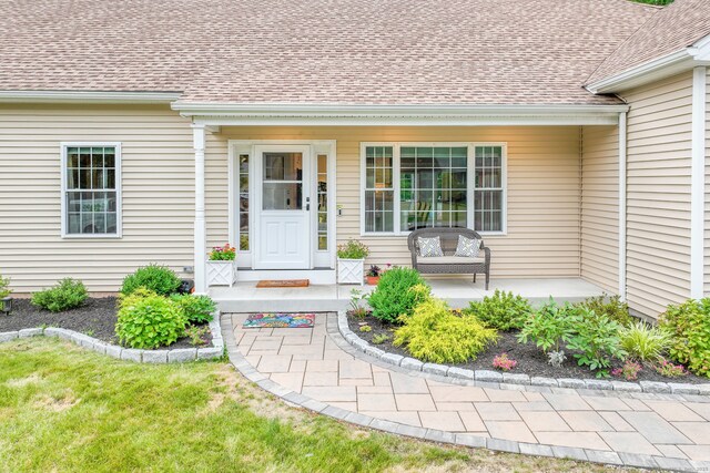 15 Contour Dr, Cheshire, CT 06410 - view of exterior entry featuring covered porch and roof with shingles