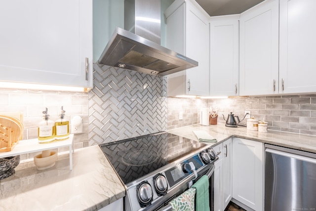 15 Contour Dr, Cheshire, CT 06410 - kitchen featuring wall chimney range hood, stainless steel appliances, decorative backsplash, and white cabinets