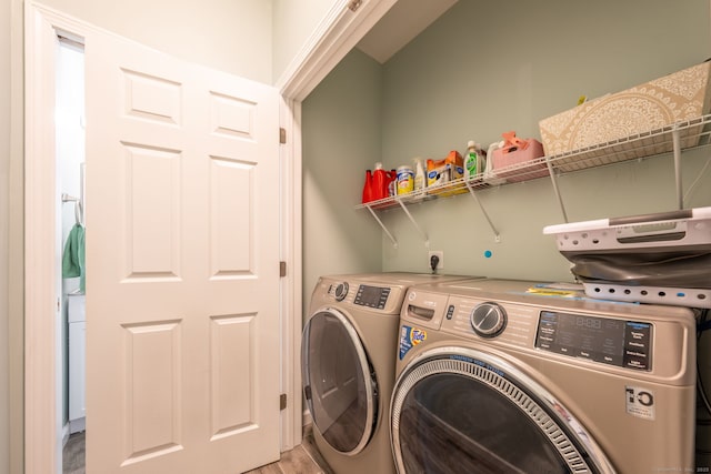 15 Contour Dr, Cheshire, CT 06410 - laundry room with washing machine and dryer and light wood-style floors