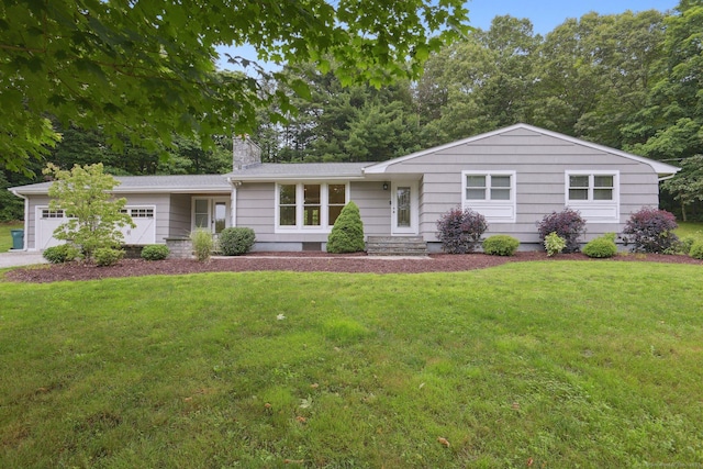 40 Chestnut Ln, Hamden, CT 06518 - single story home with a garage, a front yard, a chimney, and driveway