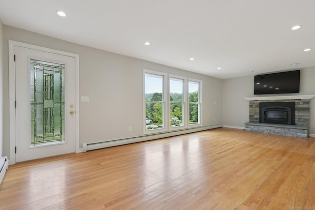 40 Chestnut Ln, Hamden, CT 06518 - unfurnished living room with a baseboard radiator, light wood-style flooring, a fireplace, and recessed lighting