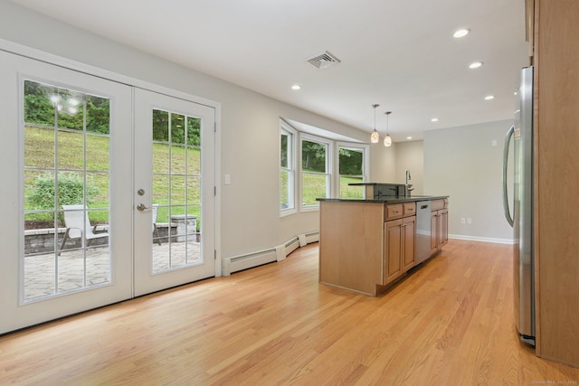40 Chestnut Ln, Hamden, CT 06518 - kitchen featuring a baseboard heating unit, french doors, stainless steel appliances, light wood-type flooring, and recessed lighting