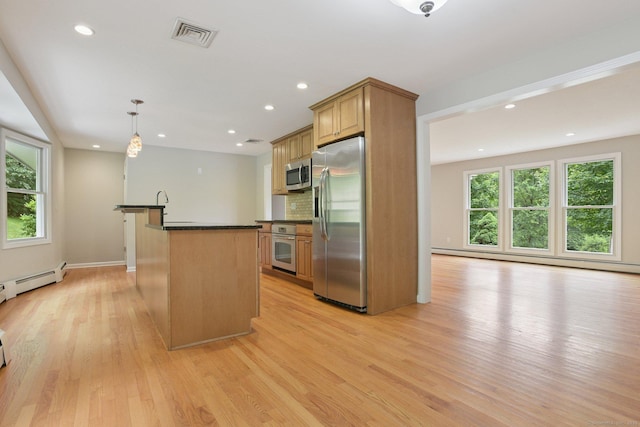 40 Chestnut Ln, Hamden, CT 06518 - kitchen with stainless steel appliances, dark countertops, light wood finished floors, baseboard heating, and recessed lighting