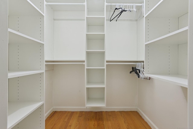 40 Chestnut Ln, Hamden, CT 06518 - walk in closet with wood finished floors