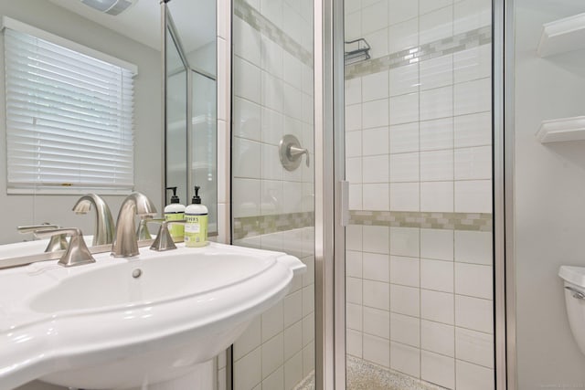 40 Chestnut Ln, Hamden, CT 06518 - bathroom featuring a sink and a shower stall