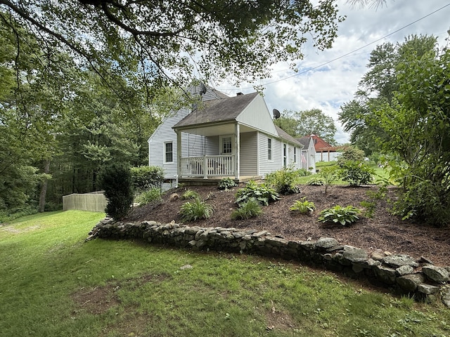 104 Wildcat Hill Rd, Harwinton, CT 06791 - view of front facade with a front lawn and roof with shingles