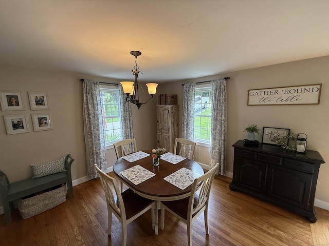 104 Wildcat Hill Rd, Harwinton, CT 06791 - dining area featuring a chandelier, healthy amount of natural light, and light wood-style floors
